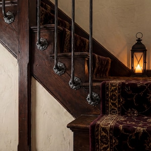 May include: A rustic wooden sign with the text "Welcome to our home" in a handwritten style. The sign features a distressed finish and a simple, inviting design, perfect for a front porch or entryway.