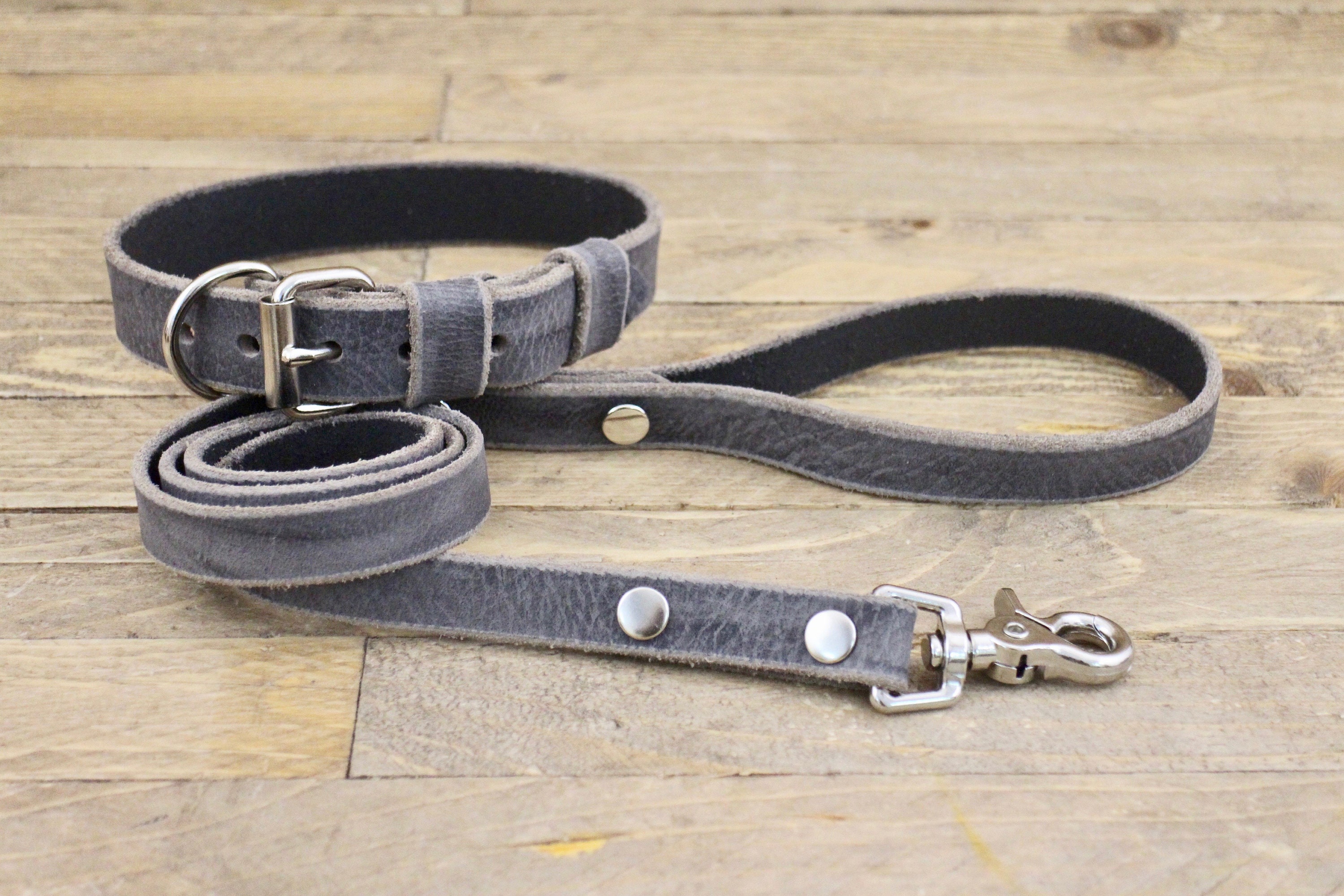 grey dog collar and lead