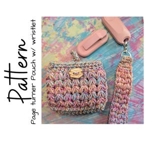 May include: A crocheted pouch and wristlet in pastel shades, with a wooden clasp. The pouch has a small handle and is next to a pink page turner and a wrist strap. The text "Pattern Page turner Pouch w/ wristlet" is on the left.