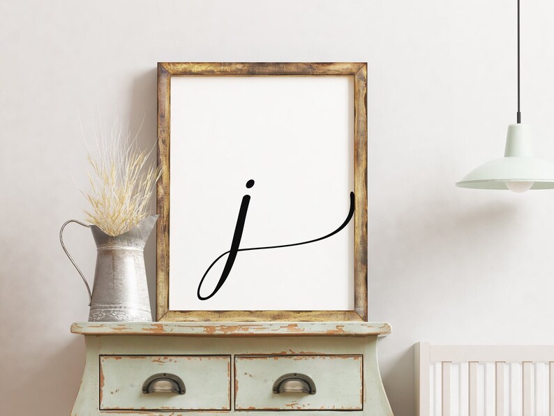 Letter J on white background.