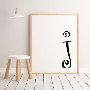 Letter J on white background.