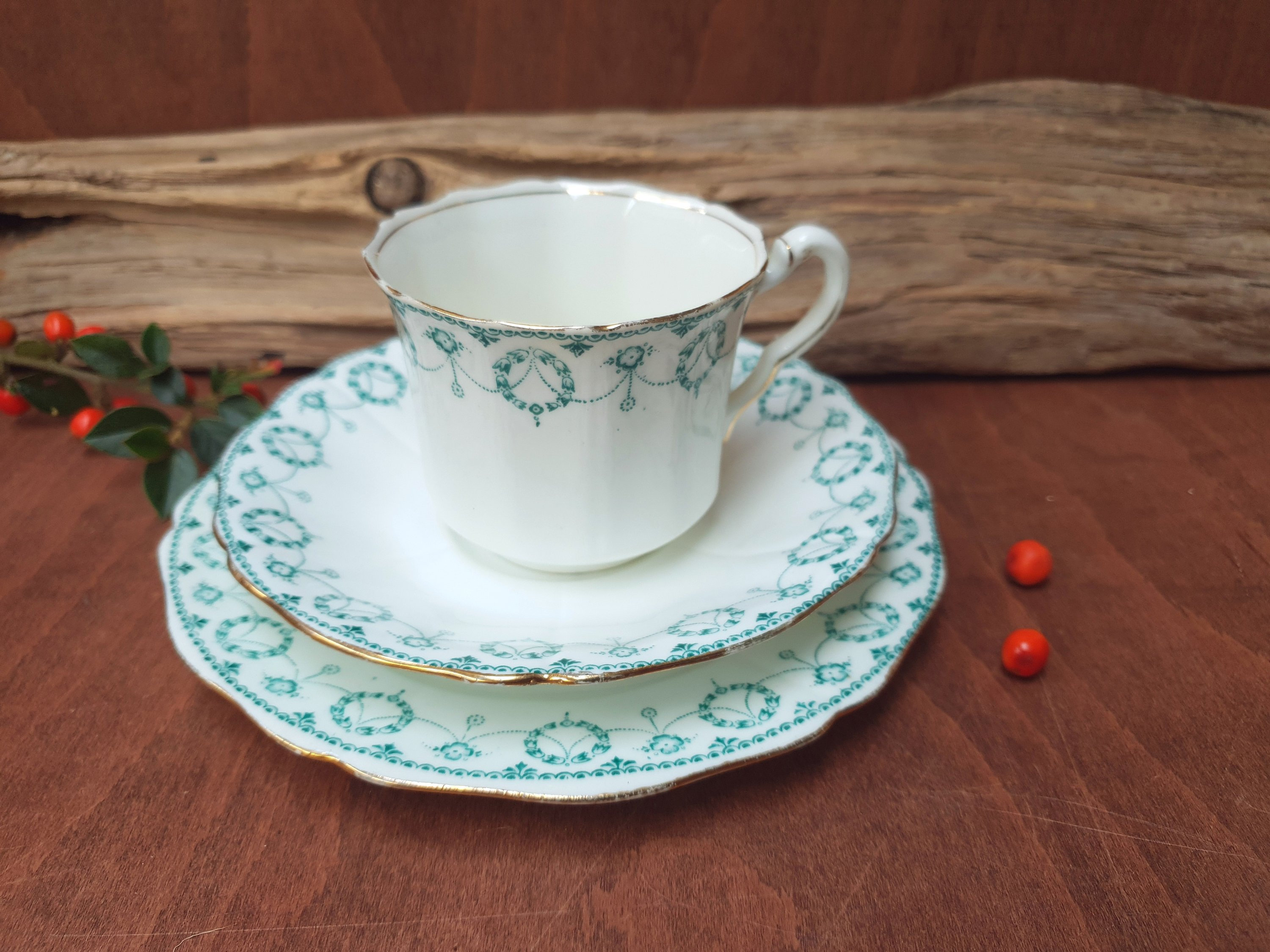 A Lovely E. Hughes and Co  china tea trio green pattern  tea cup, saucer and side plate ( Paladin, Staffordshire)