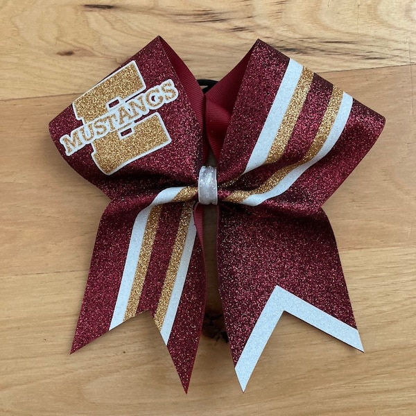 Custom Cheer Bows designed in your team colors. Price listed Is per Individual bow. Game day bow, team cheer bow, glitter cheer bows
