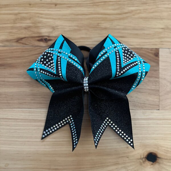 Custom cheer bow with ab rhinestones made in your team colors. Price listed is per individual bow, competition bow, team bows. Competition
