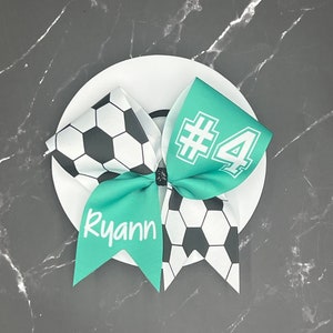 Custom Soccer bow made in your team colors. Price listed is per bow. Soccer , custom bow, team bows, Soccer bow, custom soccer bow bild 1