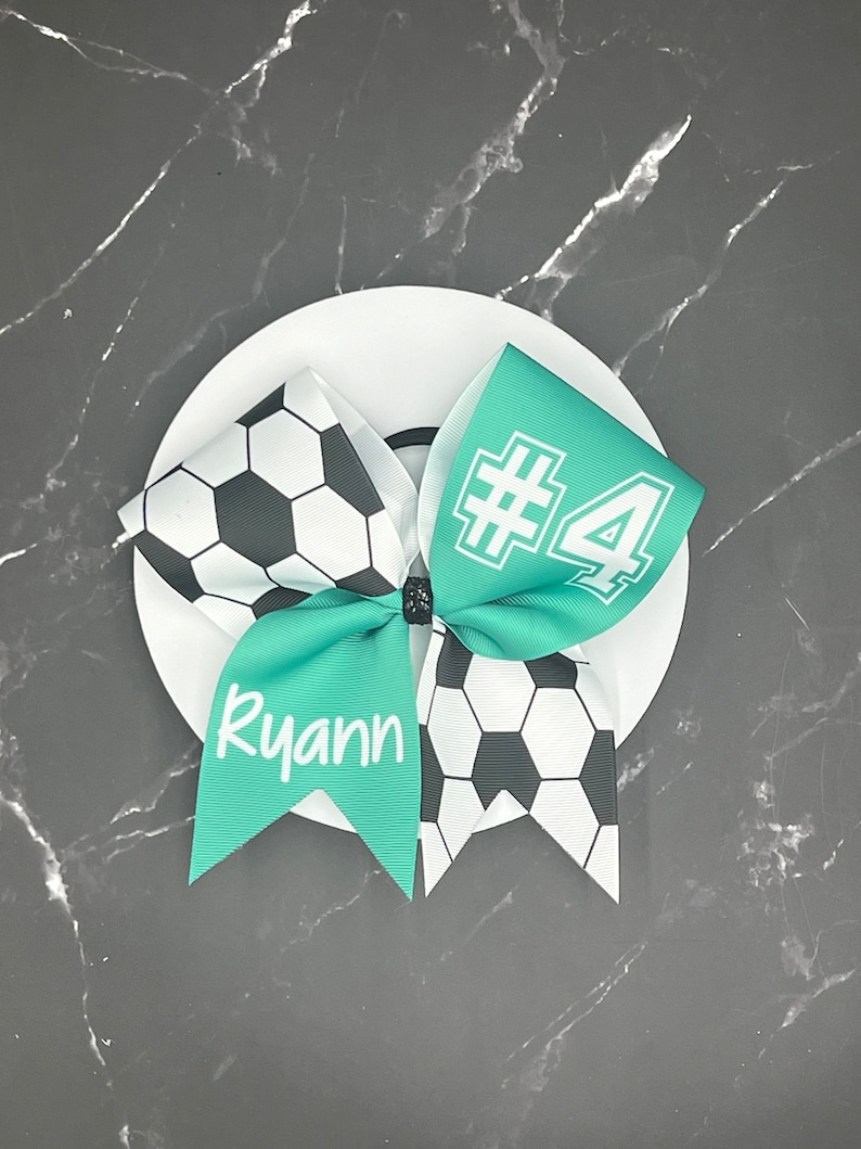 Custom Soccer bow made in your team colors. Price listed is per bow. Soccer , custom bow, team bows, Soccer bow, custom soccer bow bild 1
