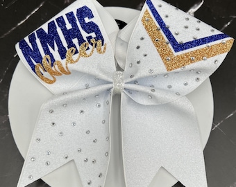 All glitter cheer bow made in your team colors. Price listed is per individual bow. Glitter bow, team bows competition bow, game day bow.