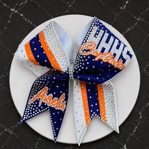 The Gaucho Custom glitter cheer bow covered in rhinestones. Bows made in your teams Colors. Price lIsted is per individual bow. Comp bow afbeelding 1