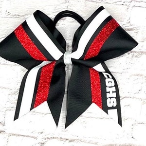 Custom cheer bow made in your team colors. Price listed is per individual bow. Comment your colors at checkout. Game day bow, camp bow