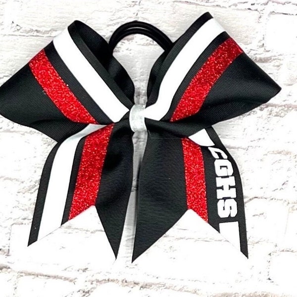 Custom cheer bow made in your team colors. Price listed is per individual bow. Comment your colors at checkout. Game day bow, camp bow