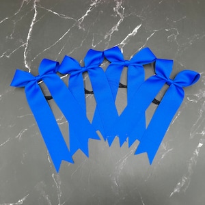 Custom college cheer bows designed in your team colors. Price listed Is per Individual cheer Bow, cheer bow, team cheer bow, College bows