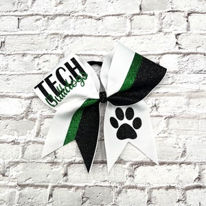 Custom Cheer Bows designed in your team colors. Price listed Is per Individual cheer bow, team cheer bow, glitter cheer bow, game day bow.