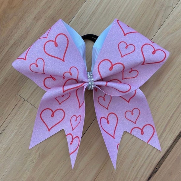 Sublimation glitter cheer bow. Pink bows, pink cheer bows, Valentine’s Day bows, pink heart bows, team bows. Heart bows, team cheer bows
