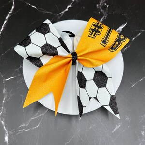 Custom Soccer bow made in your team colors. Price listed is per bow. Soccer , custom bow, team bows, Soccer bow, custom soccer bow bild 10