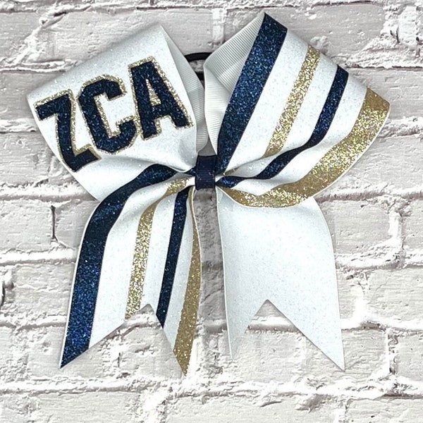 Nina Glitter cheer bow with or without personalized names.  Price listed is per individual bow. Comment colors at checkout. Game day bow.
