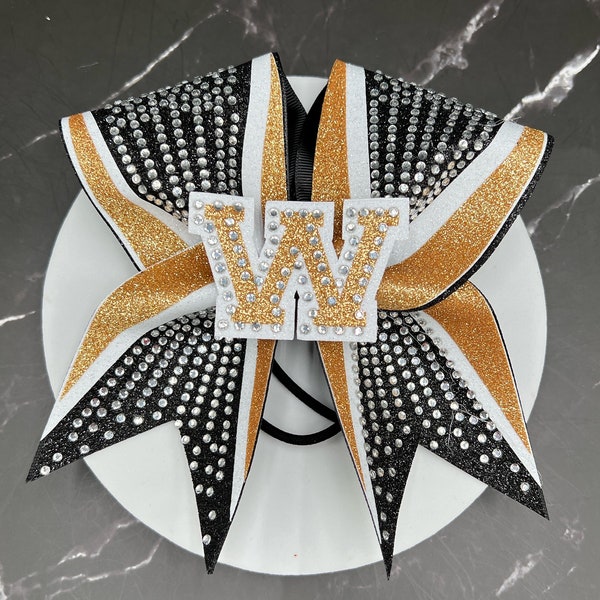 Beautiful big bling rhinestone cheer bows made in your team colors. Price listed is per individual bow. Comment colors at checkout.