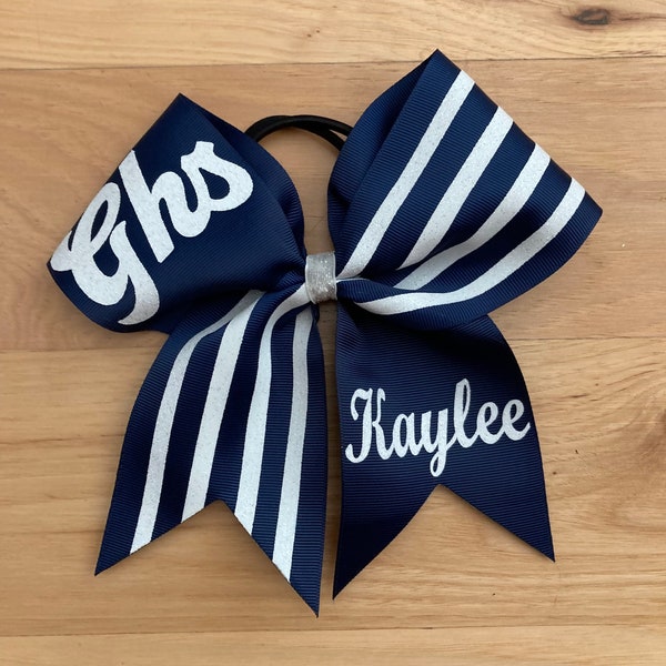 New game day cheer bow made in your team colors.  Price listed is per individual bow. Comment colors at checkout. Cheer bows