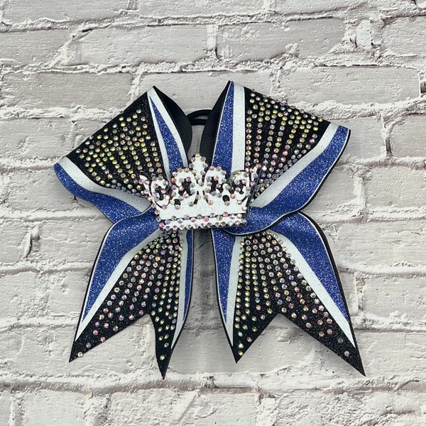 Beautiful big bling rhinestone cheer bows made in your team colors. Price listed is per individual bow. Comment colors at checkout.