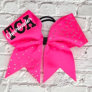 Breast Cancer Cheer Bow with rhinestones on one side. Price listed is "per bow" price. Come team initials at checkout. Pink cheer bows, pink