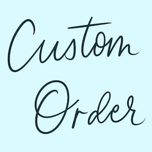 May include: A light blue background with the words "Custom Order" written in a dark teal script font. The text is centered and the script has a flowing, elegant style.