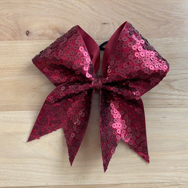 New sequin cheer bows! Price listed is per individual bow. Sequin cheer bows, new cheer bows, custom cheer bows, team bows.