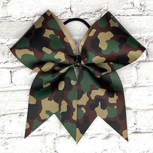 Camo bows with or without writing. Price listed is per individual bow. Camp cheer bows, camouflage bow, cheer bows CAMO, CAMO bows.