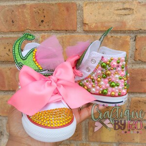 Pink dino converse best sale