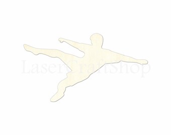 May include: A white wooden silhouette of a person kicking a soccer ball. The silhouette is cut out of a piece of wood and is ready to be painted or decorated.