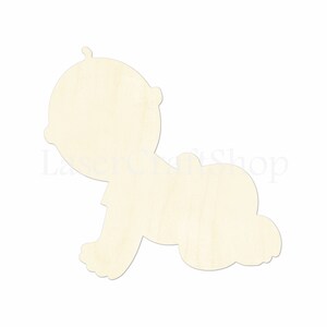 May include: A wooden cutout of a baby crawling, perfect for crafting projects or decorations.