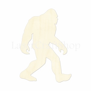 May include: A wooden cutout of a Bigfoot walking to the right. The cutout is unpainted and has a natural wood grain.