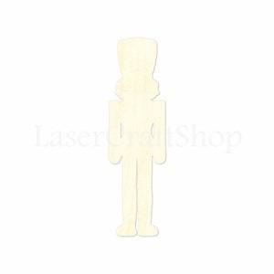 May include: A wooden nutcracker cutout, unpainted, with a simple design. The cutout is ready for crafting and decorating.