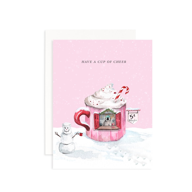 May include: A pink and red watercolor illustration of a giant mug of hot chocolate with whipped cream and a candy cane on top. The mug has a small window with a snowman looking inside. The text "5&cent; COCOA" is on a sign above the window. The mug is sitting on a snowy surface with a small snowman holding a cup of hot chocolate.