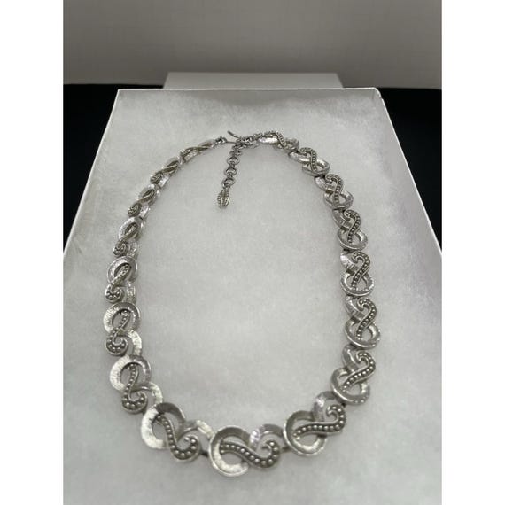 Vintage Monet 1970s Silver-toned Openwork S Ribbon Infinity Link Choker Necklace
