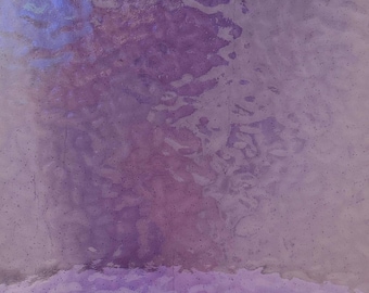 May include: Abstract background with a textured, iridescent surface. The color palette transitions from light lavender to deep purple, with hints of blue. The surface has a mottled appearance, suggesting a watercolor or painted effect.