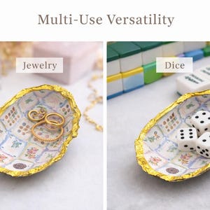 May include: An oval-shaped decorative dish with a gold-leafed rim and a white interior featuring a grid of small floral and patterned squares. The text Multi-Use Versatility, Jewelry, and Dice appear in the image. The dish holds gold rings or white dice.