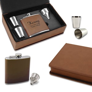 May include: A brown leatherette gift box with a silver flask engraved with the text "Kenny Best Man Today Brother Always". The box also includes two silver shot glasses and a silver funnel.
