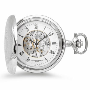 May include: A silver pocket watch with a white face and Roman numeral hour markers. The watch has a skeletonized movement, meaning the inner workings are visible. The watch is open and the lid is laying next to it. The watch has the text "CHARLES-HUBERT PARIS" on the face.