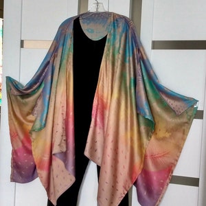 Rainbow Ruana, Cape, Robe, Topper, Duster, Shawl is Reversible and so comfortable.  Peacock Feathers in beige, purple, turquoise and pink.