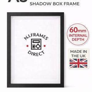 May include: A black A3 shadow box frame with a white interior. The frame has a 60mm internal depth and features the text "EXTRA DEEP SHADOW BOX FRAME". The frame is from N.I. Frames Direct and is made in the UK.
