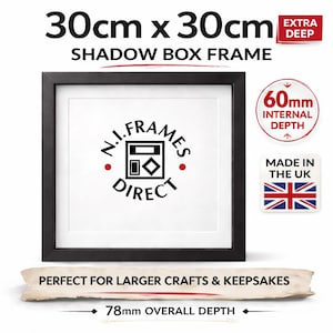 May include: A black shadow box frame, 30cm x 30cm, with a white interior. The frame has a depth of 78mm overall and 60mm internal depth. The text "N.I. Frames Direct" is printed on the white interior. Made in the UK.