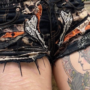 Pantalones calientes de mezclilla personalizados desgastados y lavados con ácido