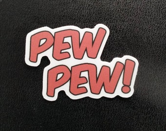 May include: A red and white sticker with the text "PEW PEW!" in a bold, cartoon font.