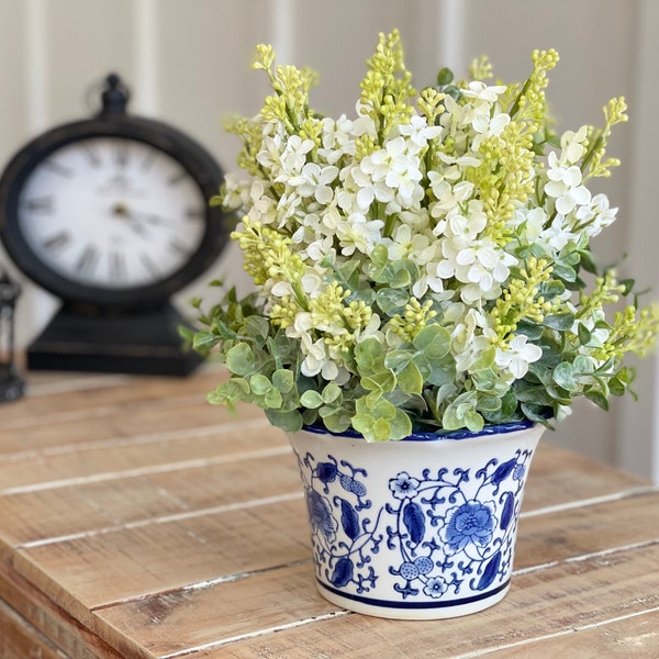 French country/farmhouse/cottage style year-round tabletop centerpiece white lilac and soft green eucalyptus , Blue,white floral vase