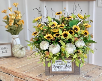 Fall farmhouse floral arrangement, autumn flowers, yellow sunflower, white pumpkin, greenery