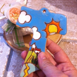 Bomboniera Tau San Francesco con campagna sole e case per  Battesimo Comunione cresima , Originale,personalizzabile Fatto a Mano in italia.