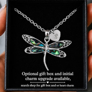 Abalone shell dragonfly necklace presented in a black gift box with optional personalised heart initial charm upgrade.