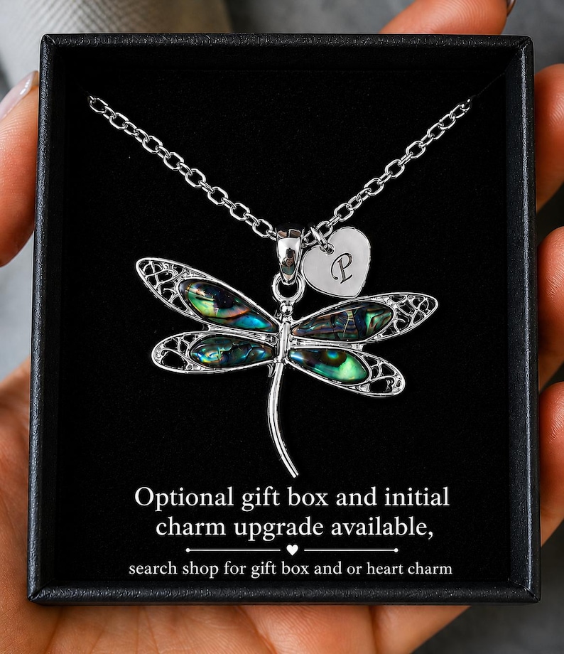 Abalone shell dragonfly necklace presented in a black gift box with optional personalised heart initial charm upgrade.