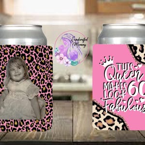 May include: Two can coolers. One features a black and gold leopard print with a photo of a young girl. The other is pink with leopard print accents and the text "This Queen Makes 60 Look Fabulous."