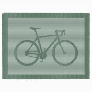 May include: A rectangular, sage green rug with a dark green bicycle silhouette in the center. The rug has a textured appearance with a darker green border.