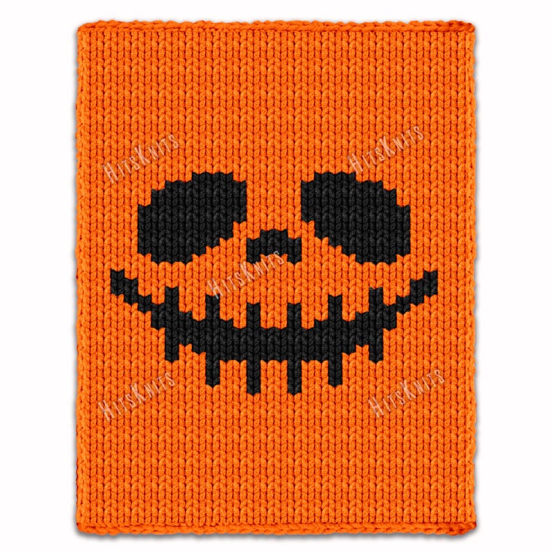 May include: Orange knitted Halloween-themed item with a black jack-o'-lantern face. The face features black eyes, a nose, and a jagged mouth. The item is likely a blanket or pillow cover. The text "HitsKnits" is visible in the corners.